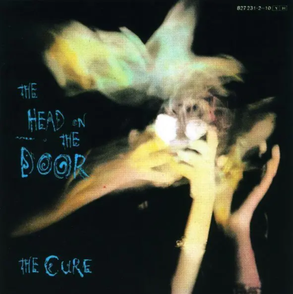 CURE - Head On The Door. Okładka płyty